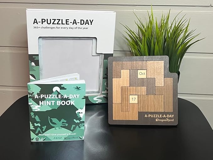 A-Puzzle-A-Day Premium Boxed Edition: The Original Calendar Puzzle with 365+ Challenges for Every Day of The Year, by DragonFjord, with Magnetic Storage Box and Hint Book.