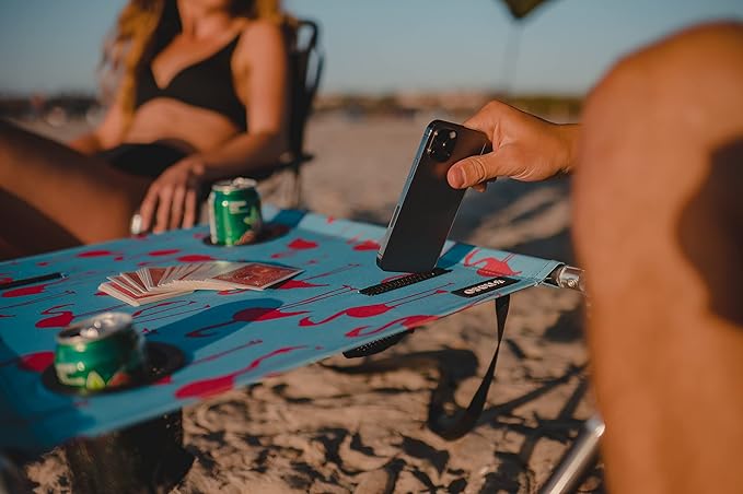 Neso Portable Beach Table with Cup Holders, Cell Phone Pockets, Lightweight for Picnics and Parks (Flamingos)